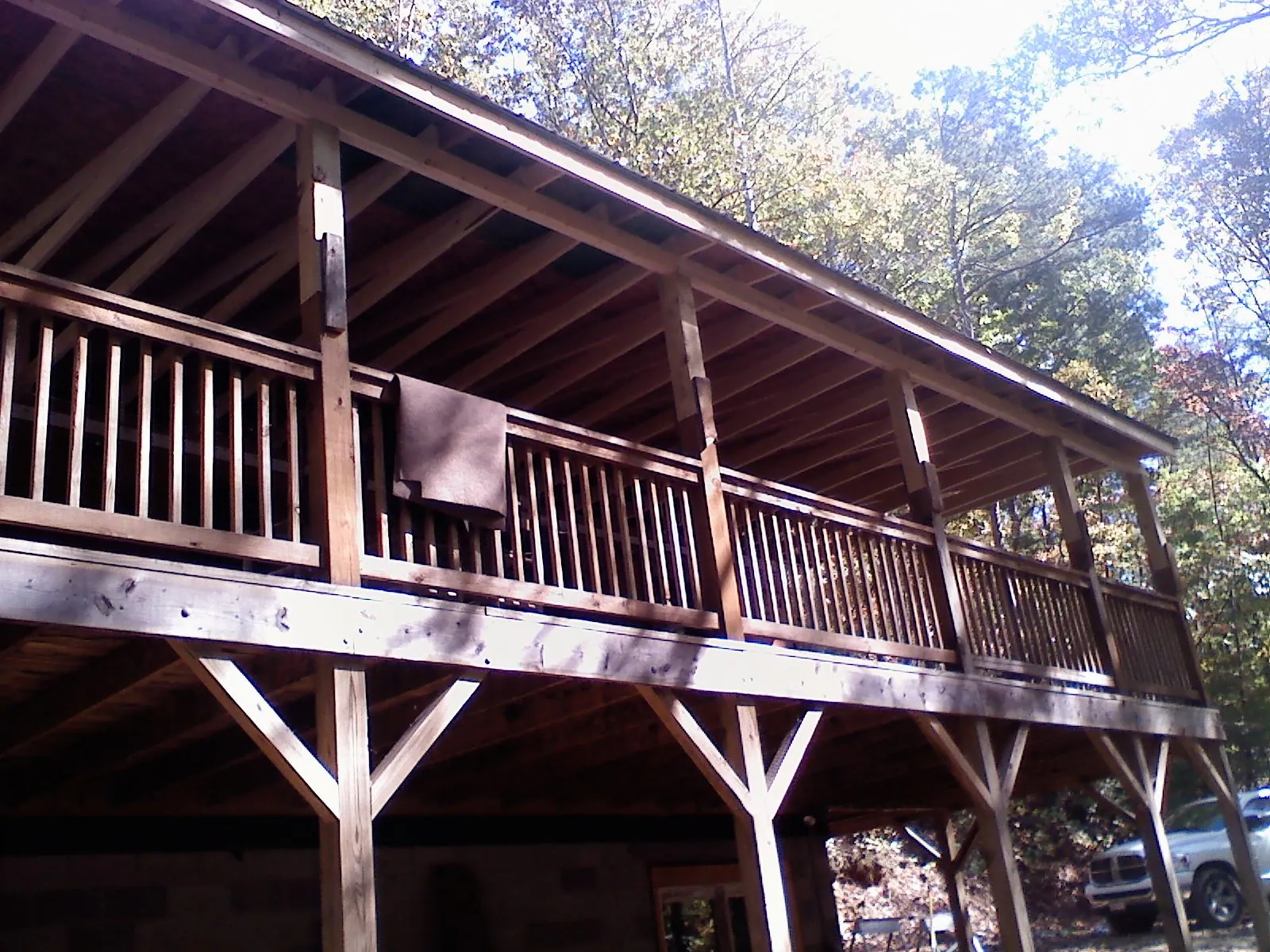 Timber framing under a new elevated porch and deck — Roof Leak Repair in Mount Rainier by Roofing Brothers